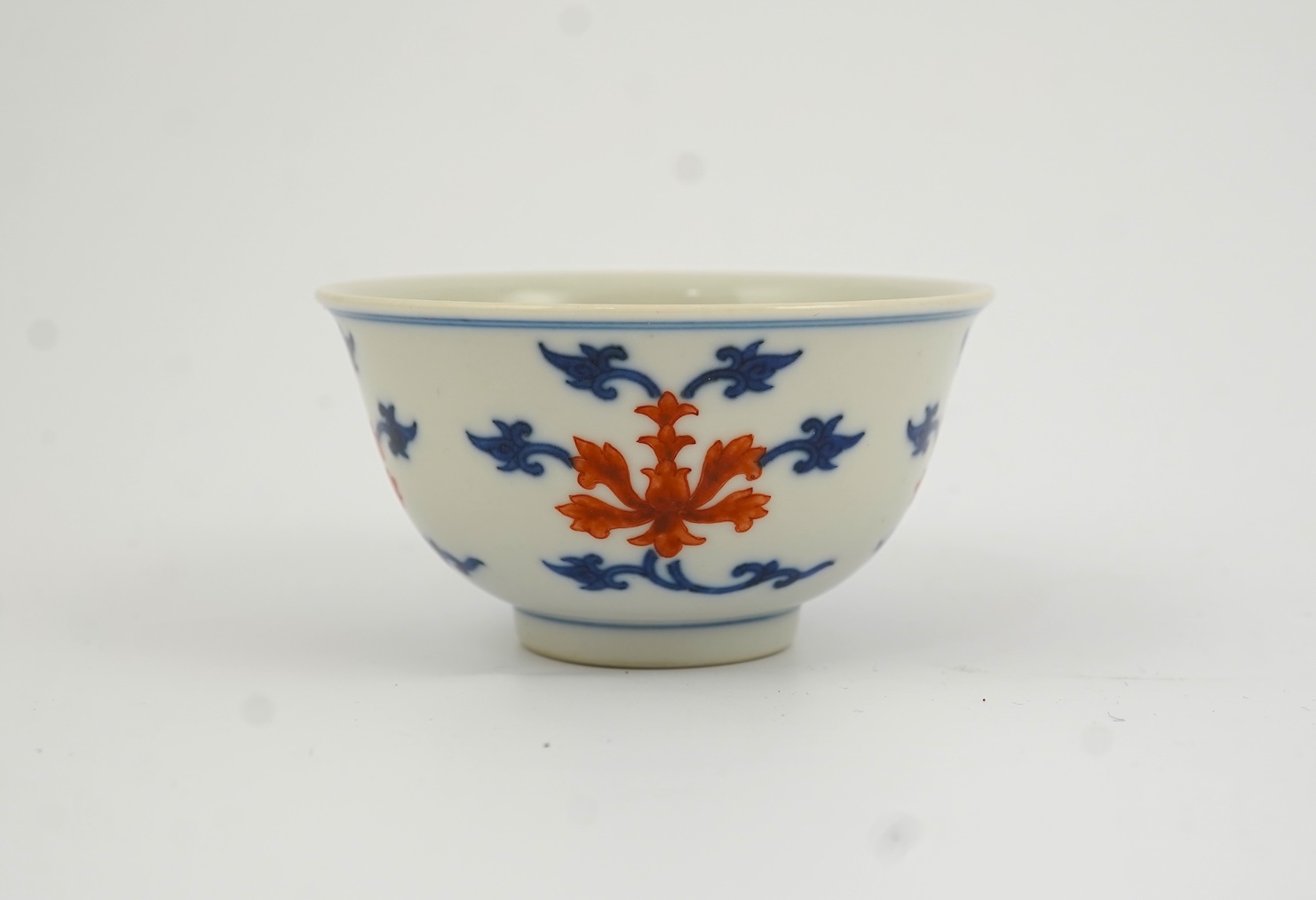 A Chinese underglaze blue and iron red bowl, Daoguang seal mark and possibly of the period